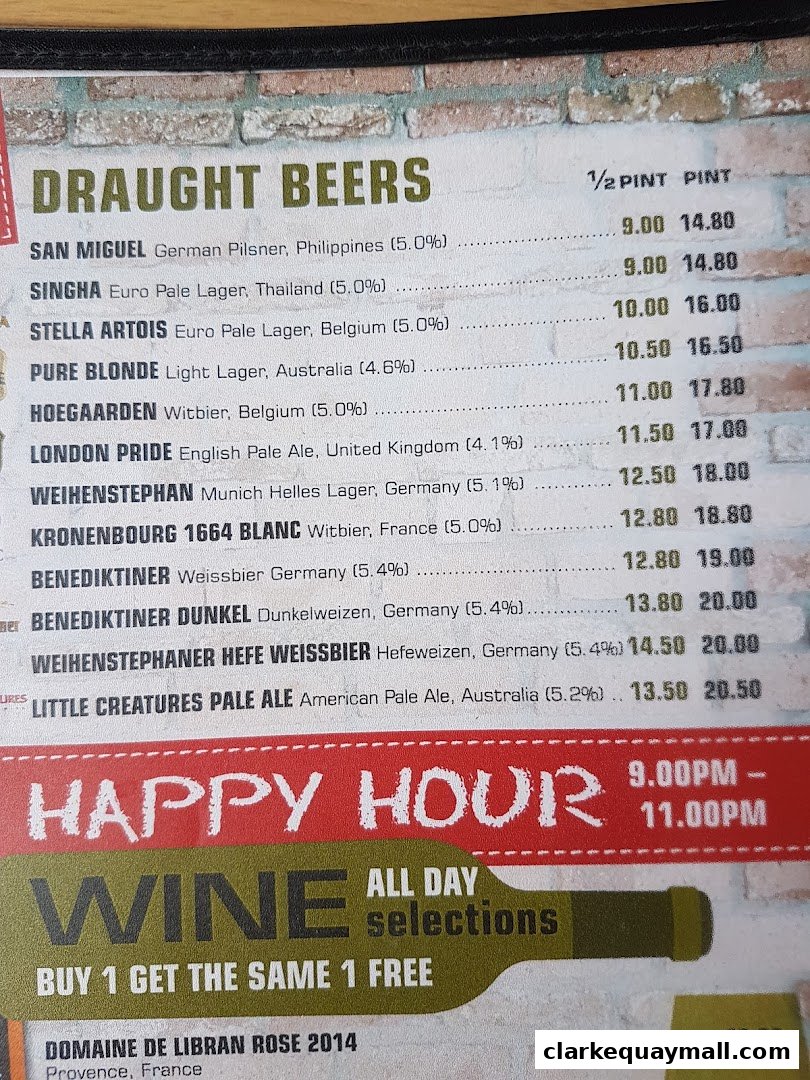 A menu featuring draught beers, happy hour, and wine selections with prices.
