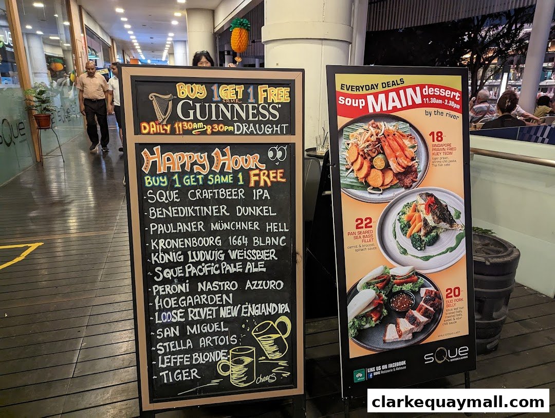 A shop front with two A-frame signs advertising happy hour deals and daily specials.