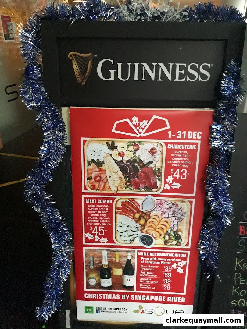 A Christmas promotion menu for SQUE Rotisserie & Alehouse featuring charcuterie and meat platters.