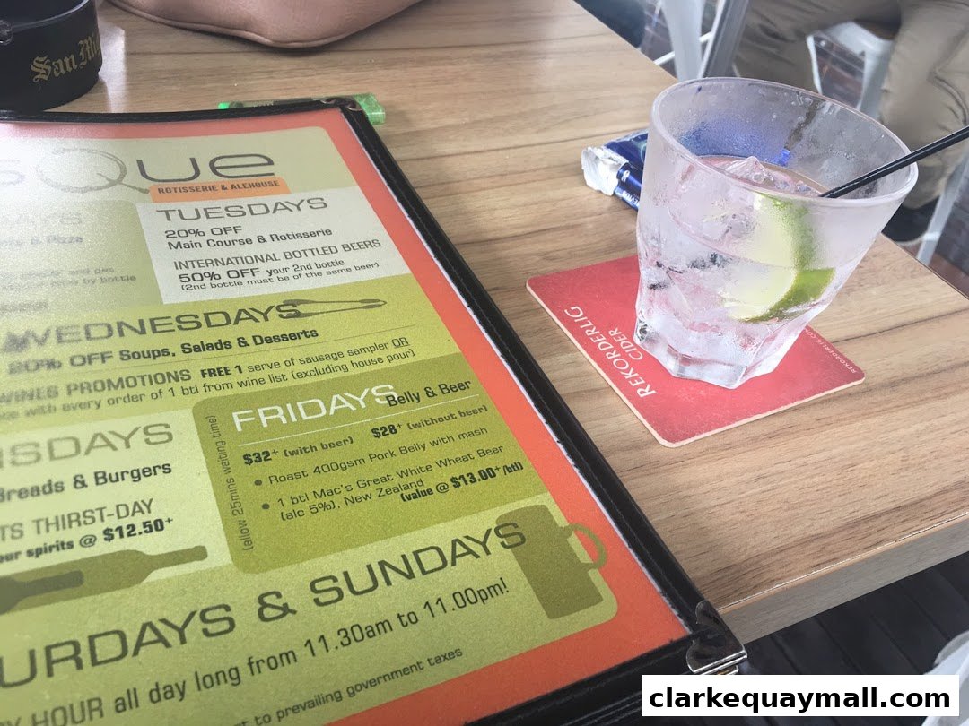 A menu from SQUE Rotisserie & Alehouse with daily specials and a drink.