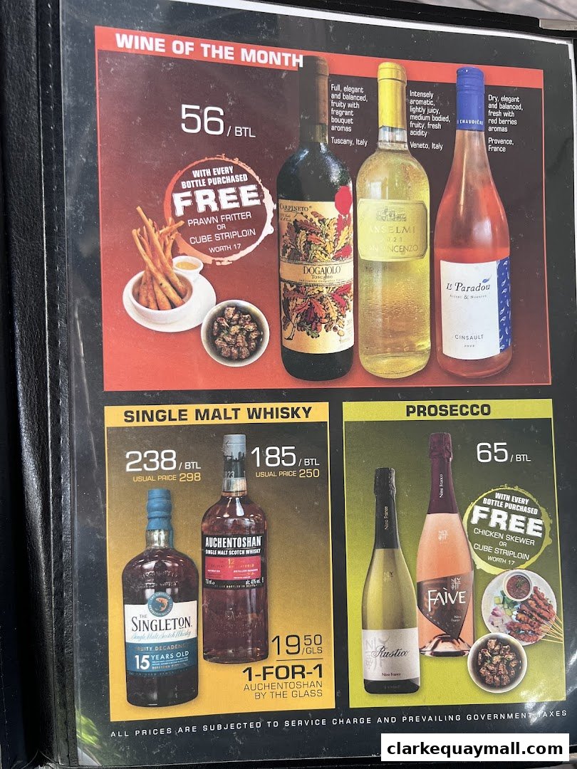A menu featuring wine, whisky, and prosecco specials with accompanying food offers.