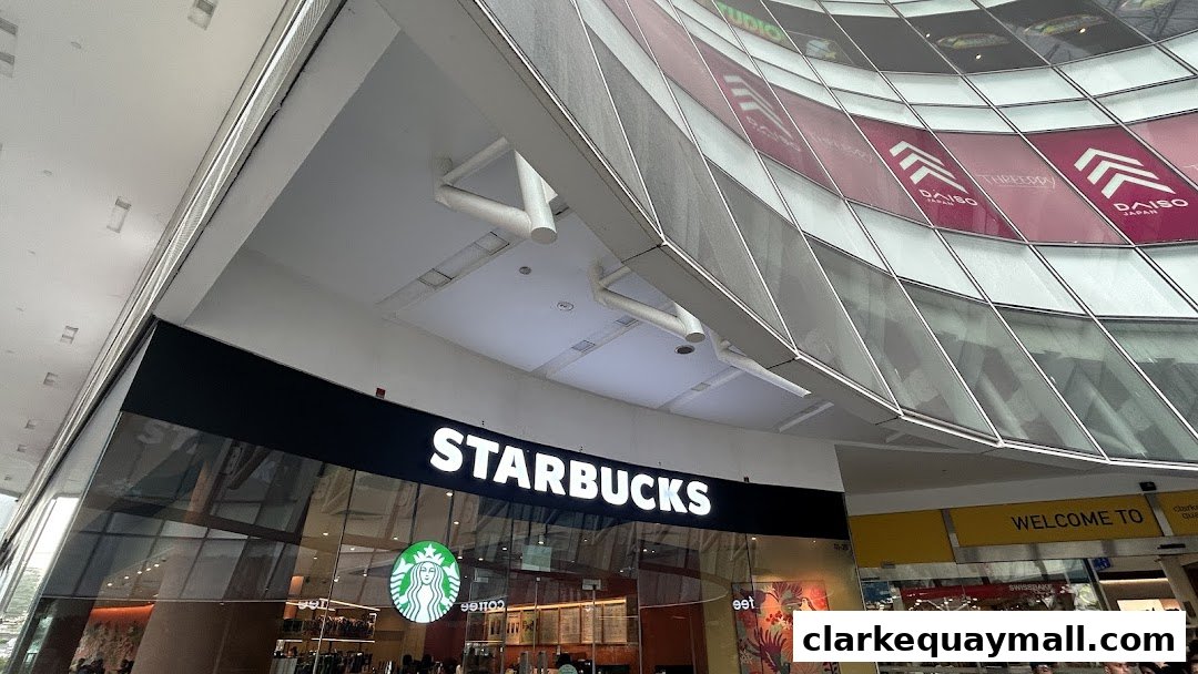 The exterior of a Starbucks coffee shop with its iconic logo and signage.