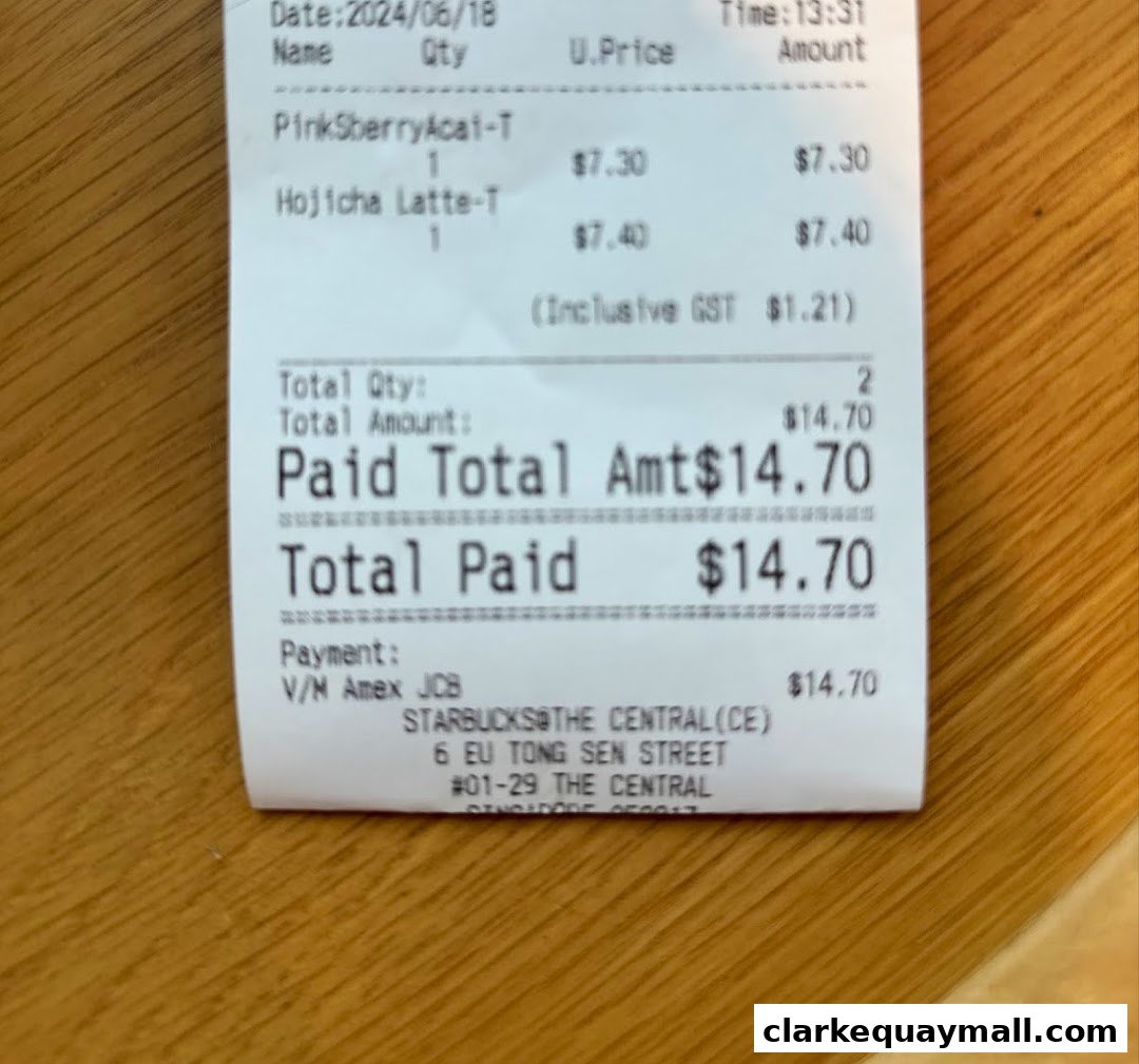 A receipt from Starbucks The Central showing two drinks and the total amount paid.