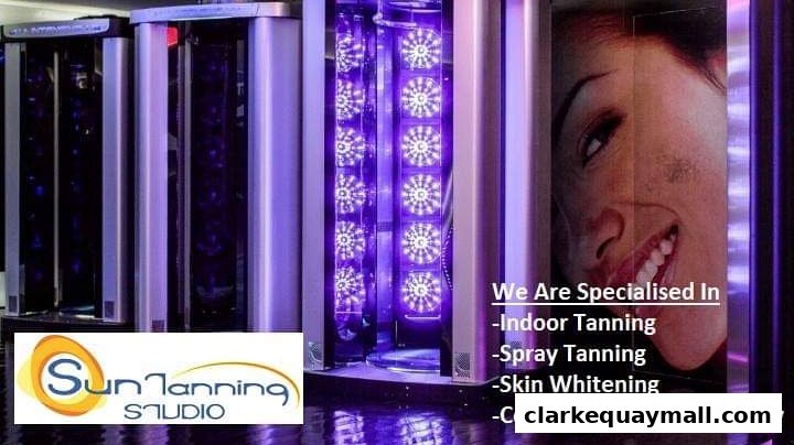 Sun Tanning Studio showcases tanning beds and lists specialized services like indoor tanning and spray tanning.