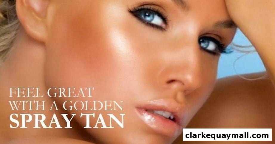 Close-up of a woman with a golden spray tan, promoting the service.