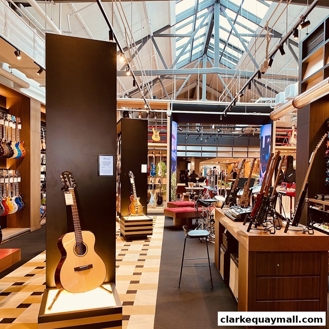 Interior view of a well-lit music store showcasing a variety of guitars and musical equipment.