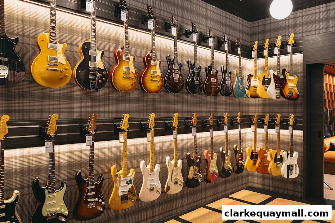 A wall display of various electric guitars in a retail store.