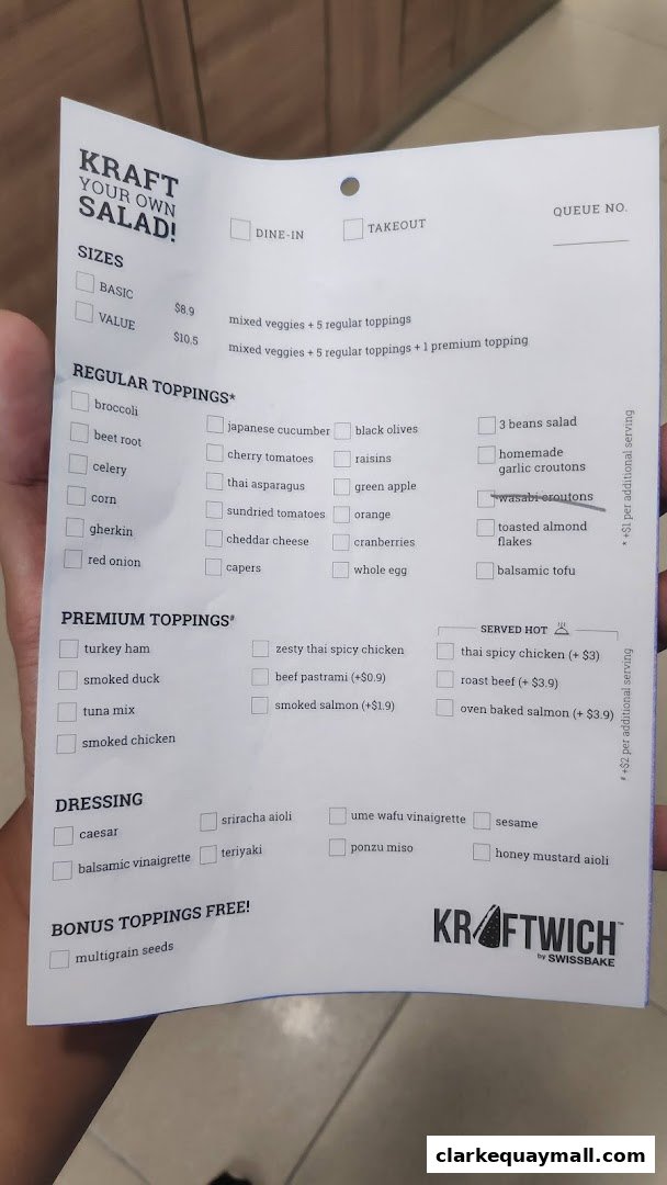 A menu for Kraft Your Own Salad with various topping and size options.