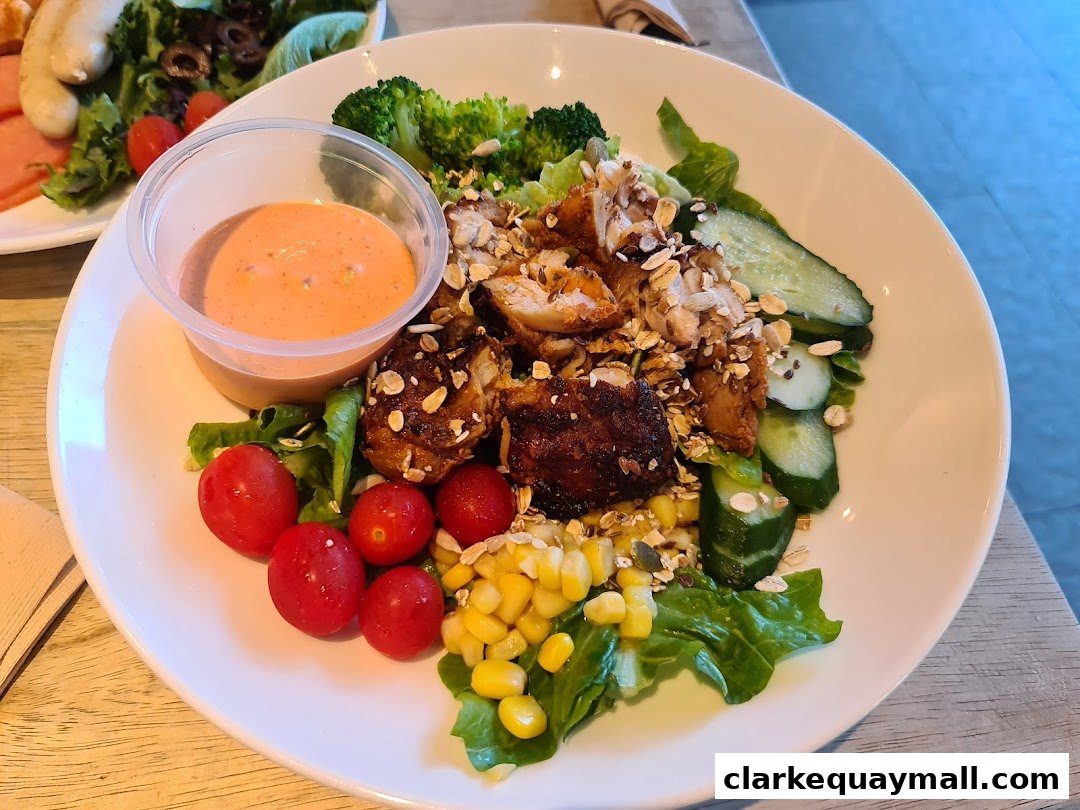 A delicious chicken salad with fresh vegetables and a creamy dressing.