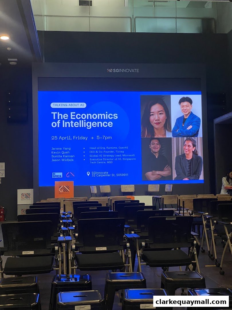 A presentation screen displays information about 'The Economics of Intelligence' event with speakers.