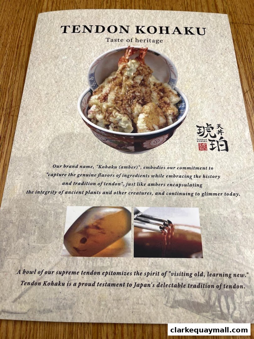 A menu page for Tendon Kohaku featuring a bowl of tendon and descriptive text.