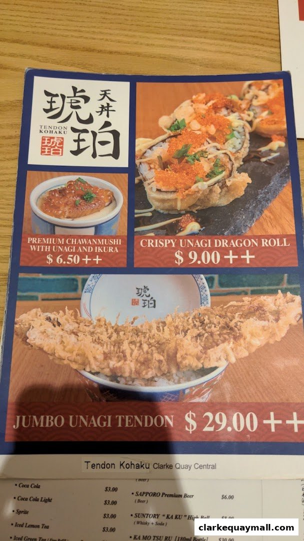 A menu from Tendon Kohaku featuring various Japanese dishes like Unagi Tendon and sushi rolls.
