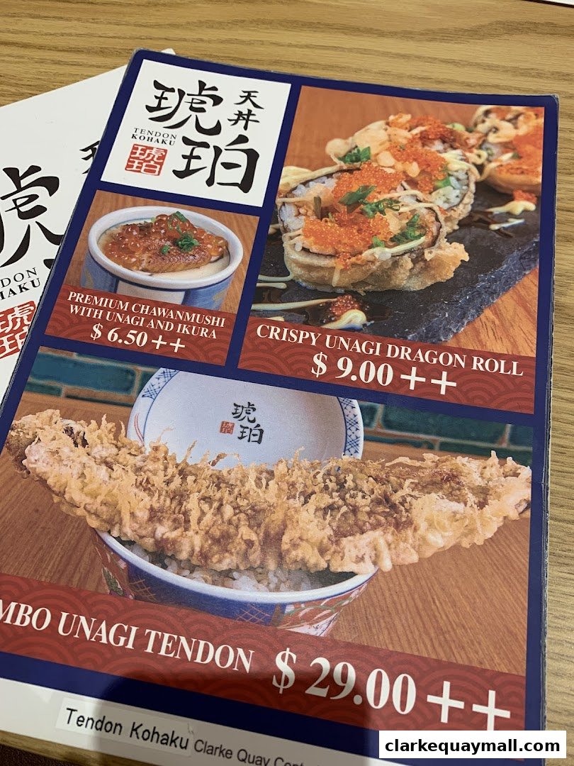 A menu from Tendon Kohaku featuring Unagi dishes and sushi rolls.