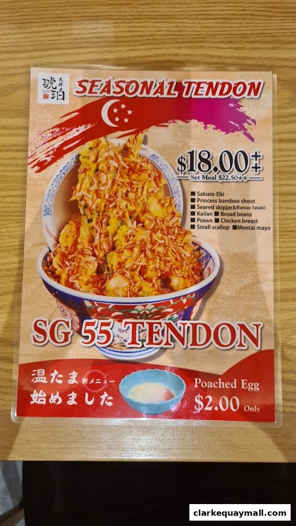 A menu featuring a seasonal tendon dish with various ingredients and a poached egg add-on.