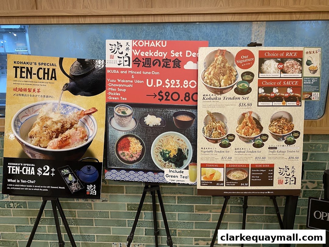 A display of menus and specials for Tendon Kohaku, featuring various tendon sets and a special Ten-Cha dish.