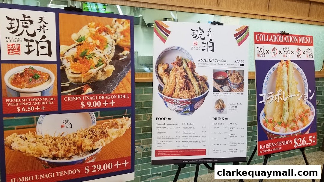 A display of Tendon Kohaku's menu items, featuring various tendon bowls and sushi.
