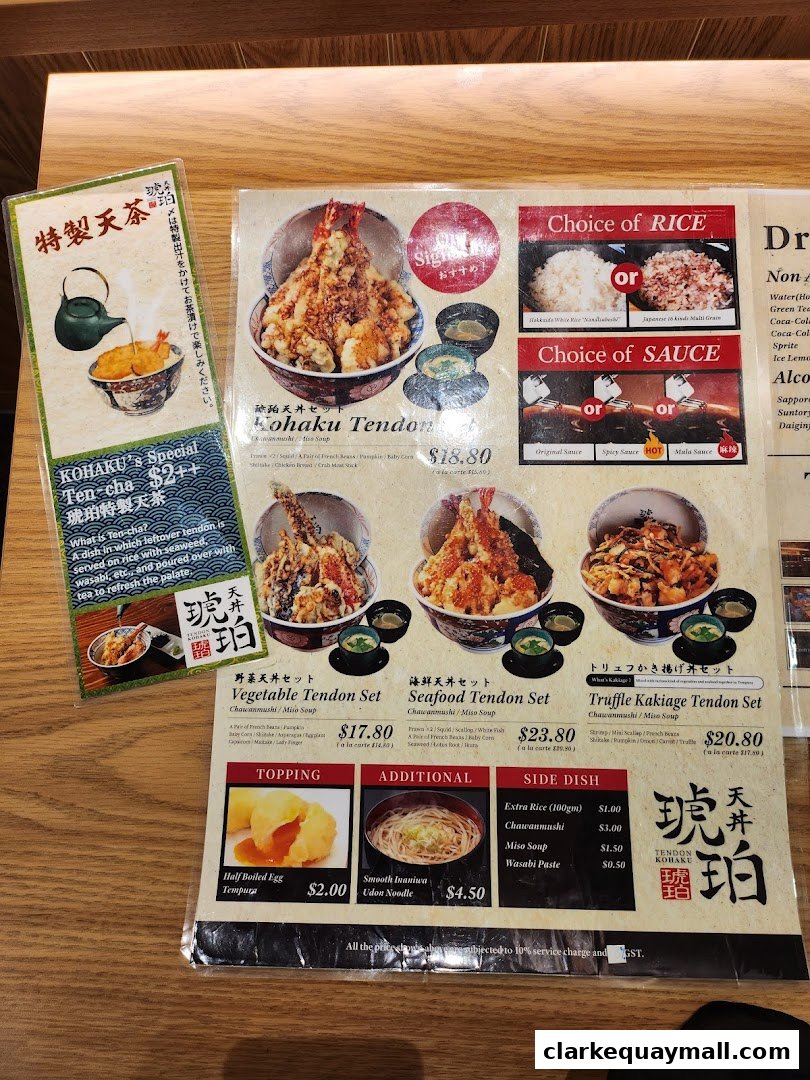 A menu from Tendon Kohaku featuring various tendon sets, toppings, and side dishes.