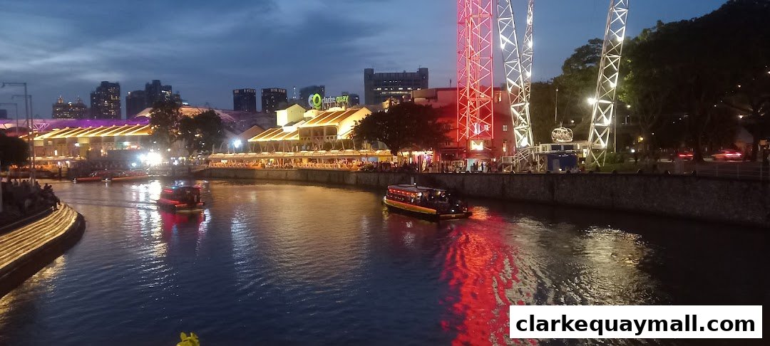 A scenic view of Clarke Quay at dusk with boats on the river and illuminated buildings.