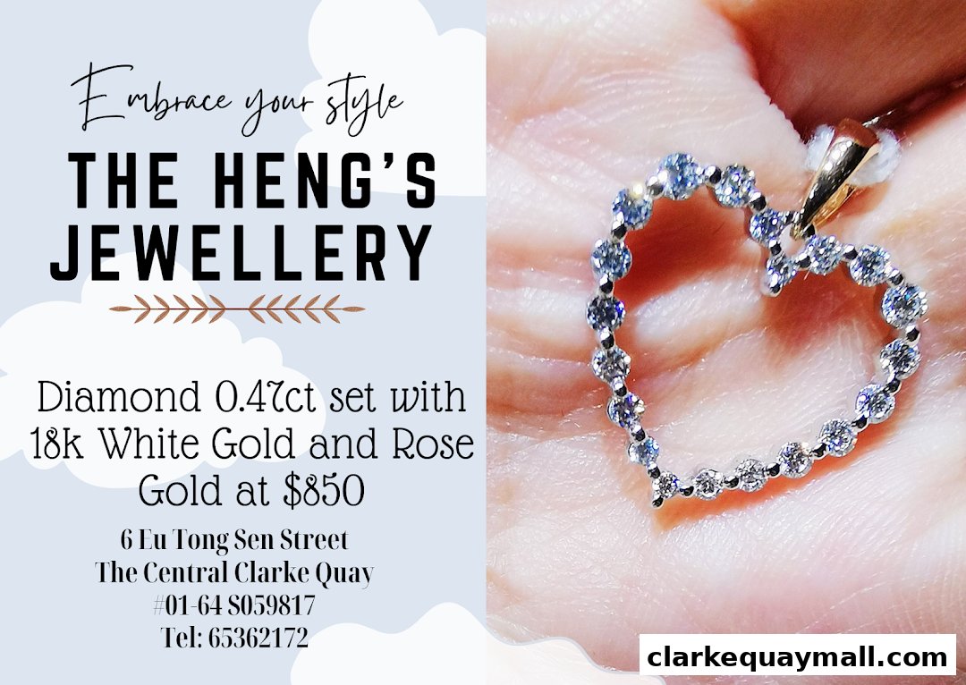 A close-up of a diamond-encrusted heart pendant from The Heng's Jewellery.