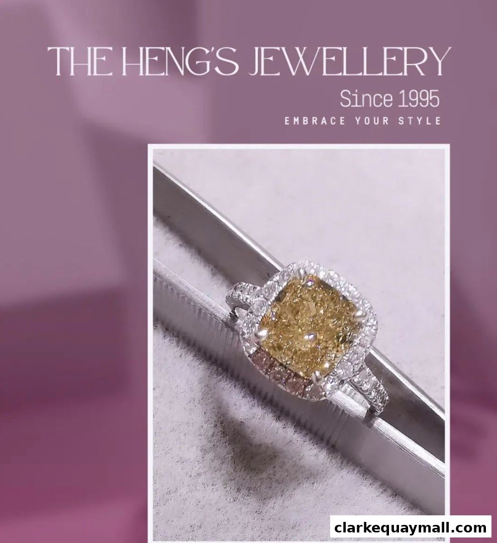 A stunning yellow diamond ring with a halo of white diamonds, presented by The Heng's Jewellery.