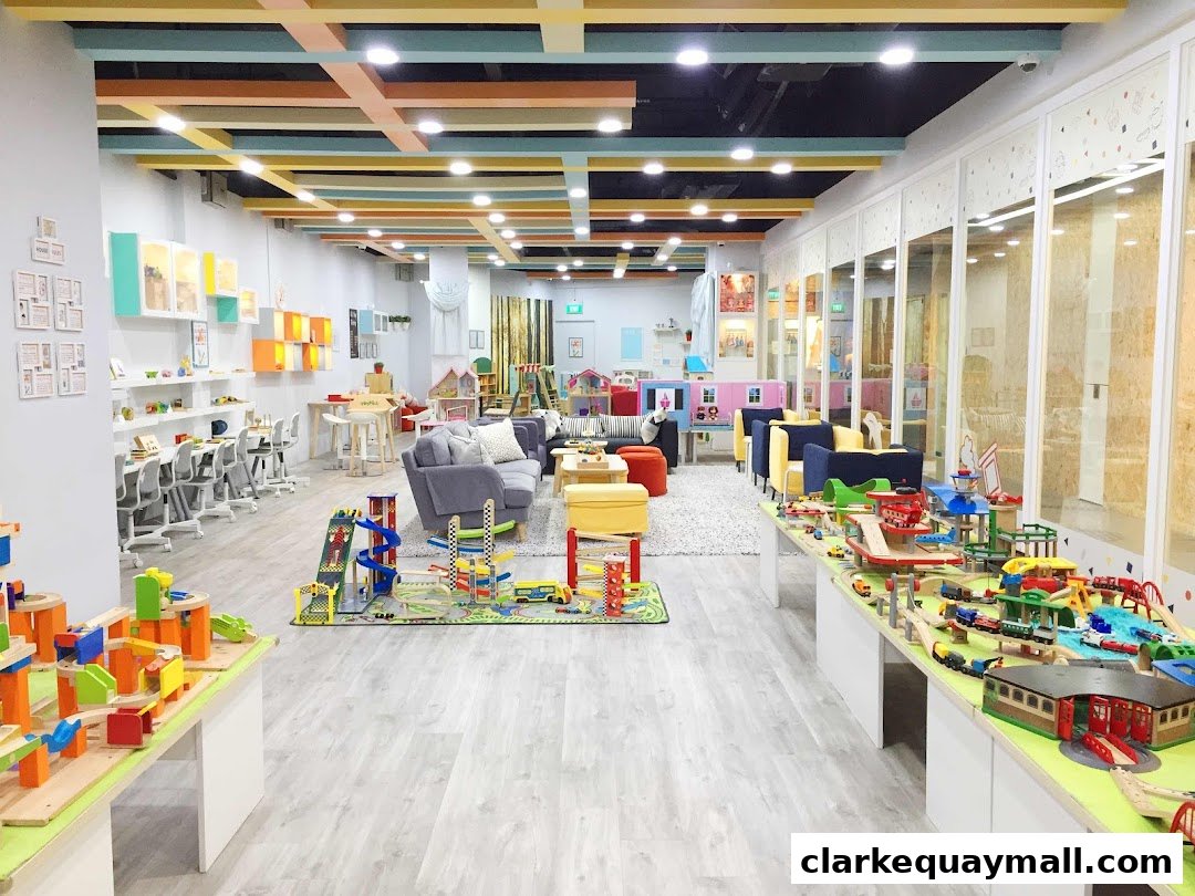 Interior of a brightly lit toy store with colorful displays and play areas.