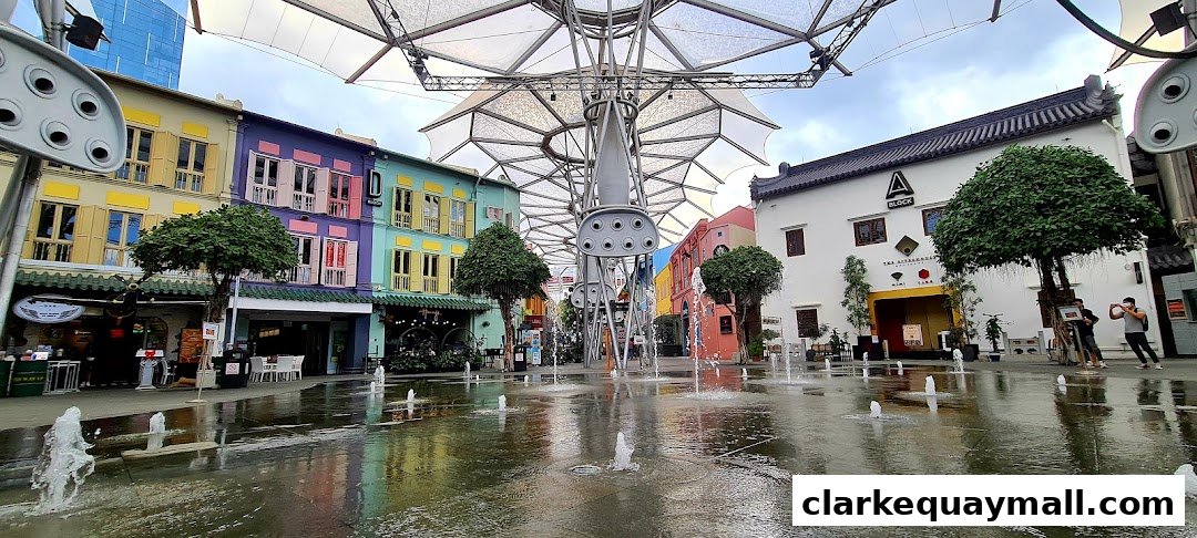 A vibrant street scene with colorful buildings, fountains, and people enjoying the outdoors.
