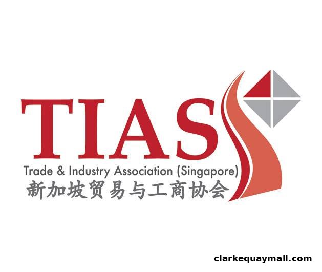 The logo for Trade & Industry Association (Singapore) features bold red lettering and a stylized graphic.