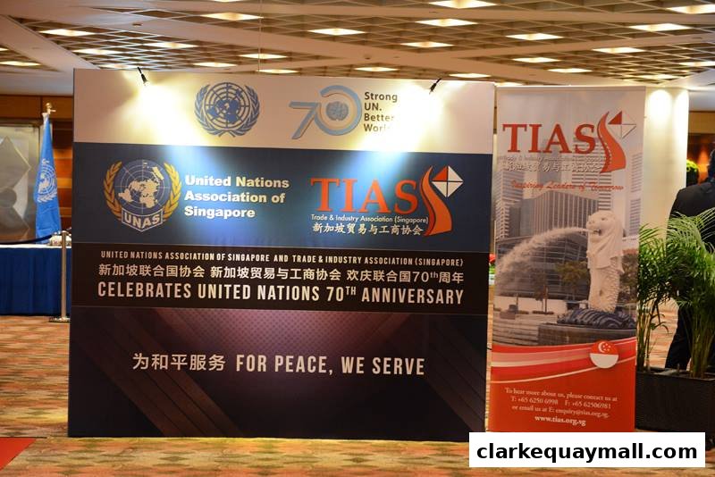 Banners celebrating the United Nations 70th Anniversary and the Trade & Industry Association of Singapore.