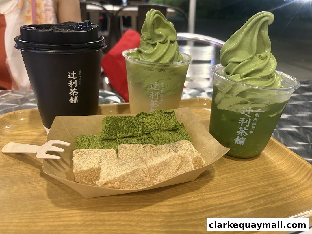 A tray with matcha soft serve, a matcha drink, and mochi.