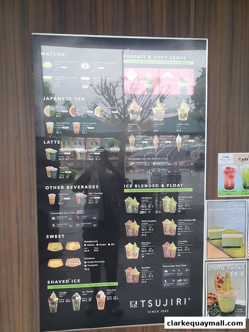 A menu board for TSUJIRI The Central Store, featuring matcha drinks, parfaits, lattes, and shaved ice.