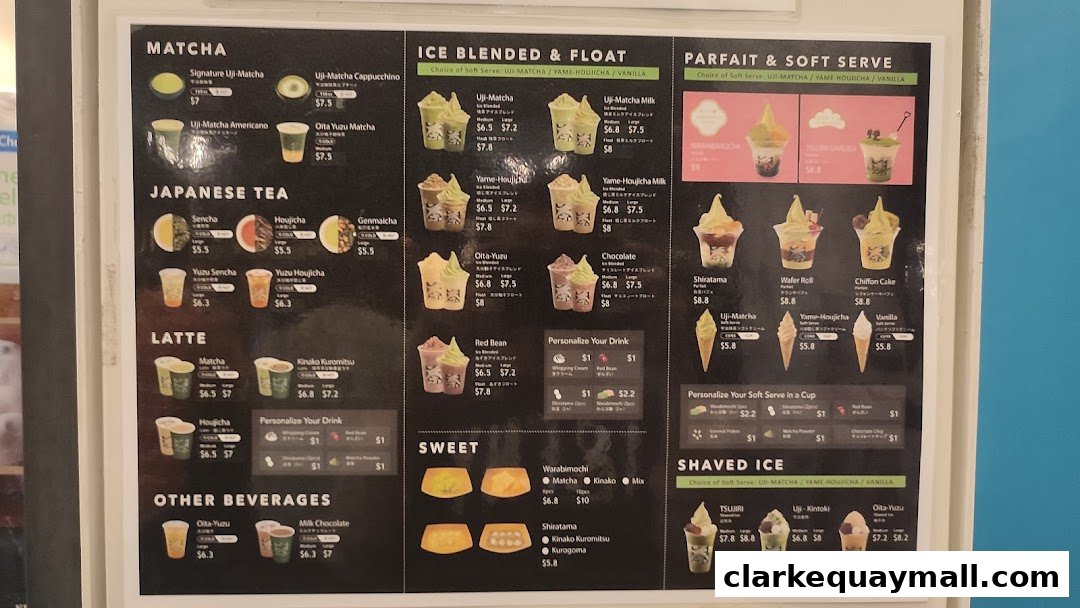 A menu board displaying various matcha, tea, latte, ice blended, parfait, and shaved ice desserts and drinks.