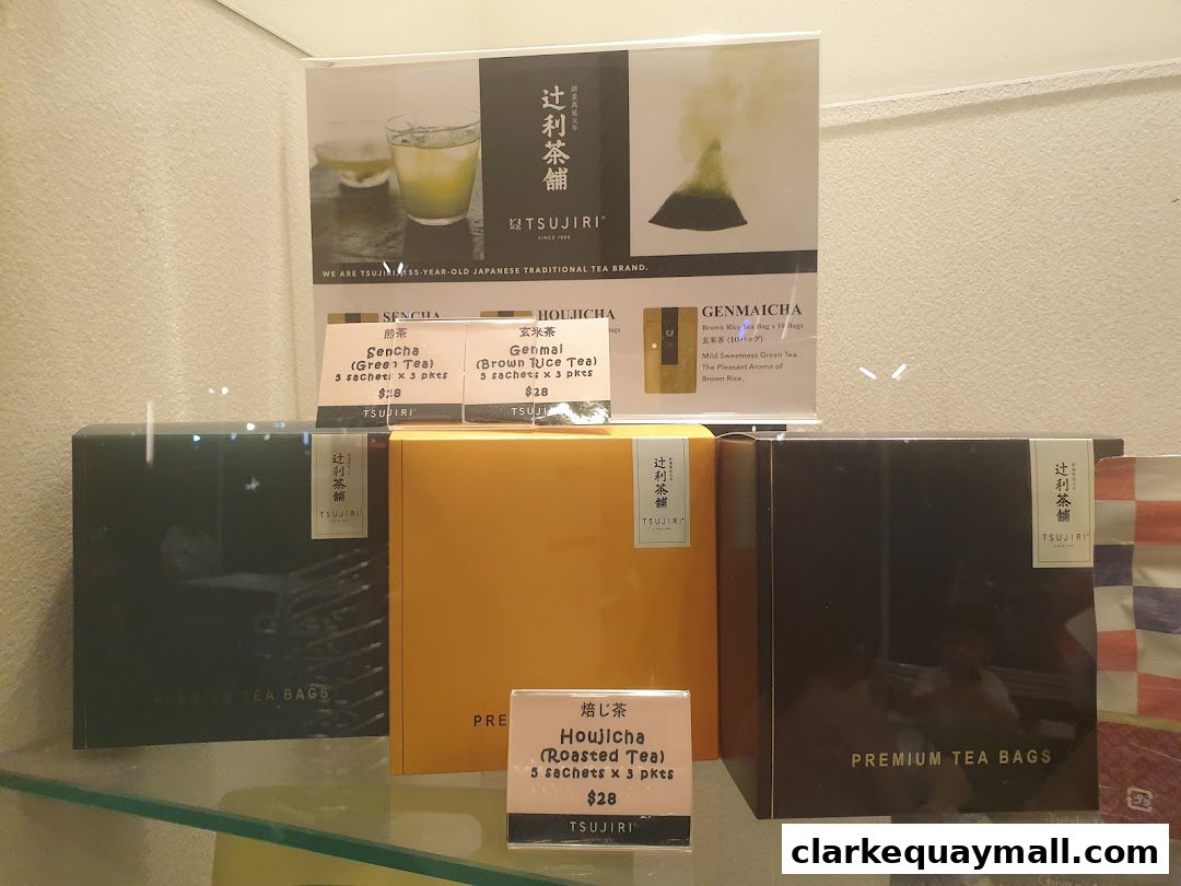Display of premium tea bags from TSUJIRI, featuring Sencha, Hojicha, and Genmaicha.