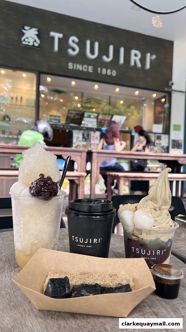 A table with various Japanese desserts and drinks from TSUJIRI.