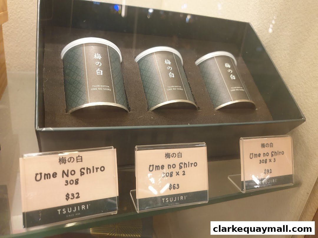 Three tins of TSUJIRI Matcha Ume No Shiro are displayed with price tags.