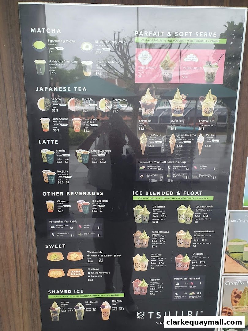 A menu board for TSUJIRI featuring matcha drinks, Japanese teas, lattes, parfaits, and shaved ice.