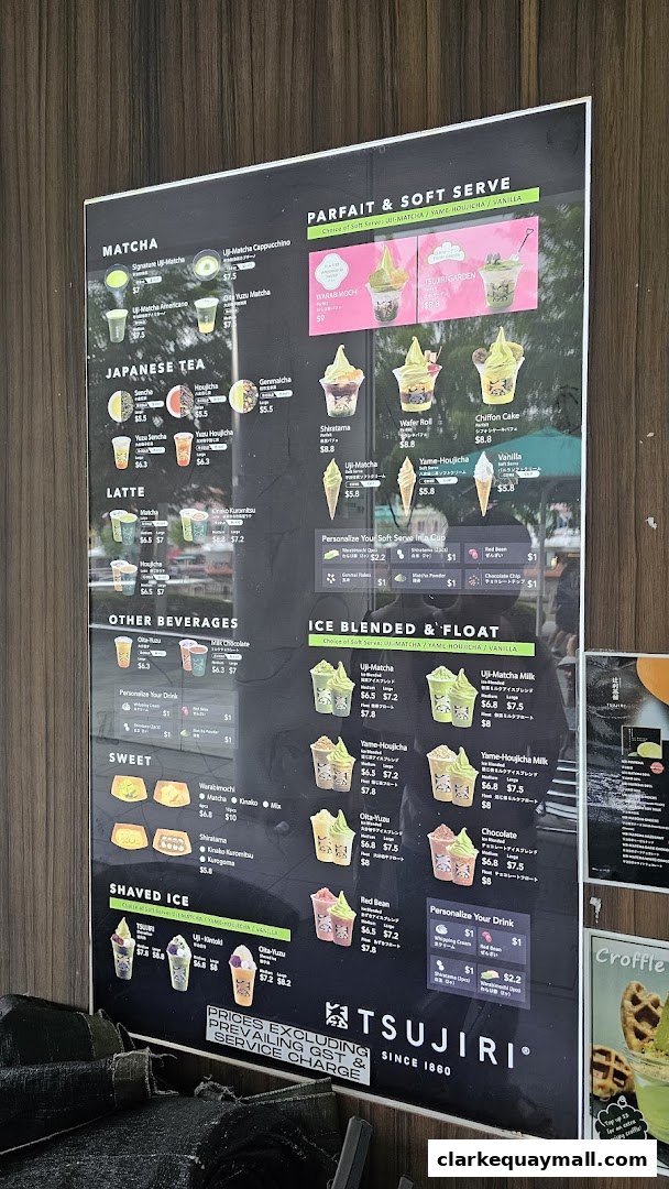 A menu board for TSUJIRI The Central Store, featuring matcha drinks, parfaits, soft serve, and shaved ice.