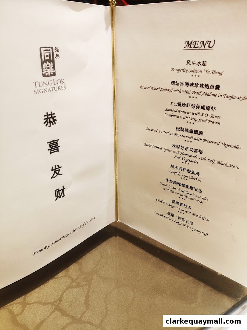 A menu from TungLok Signatures featuring Chinese dishes and a prosperity gift.