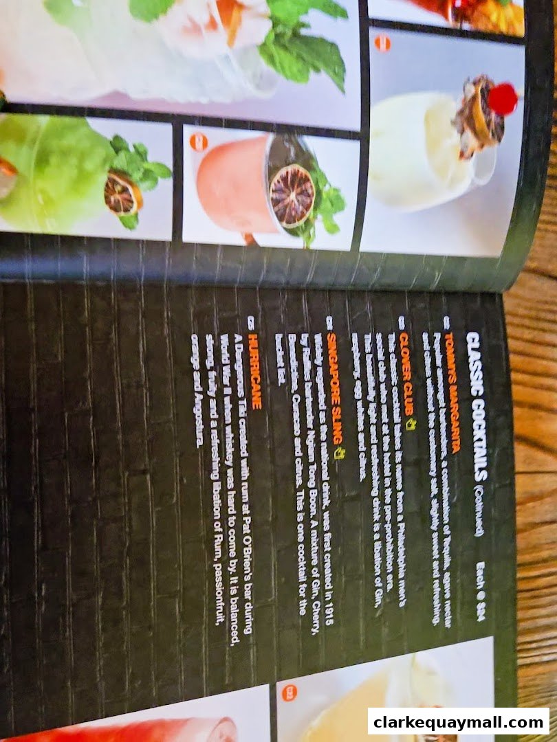 A menu featuring classic cocktails with descriptions and prices.