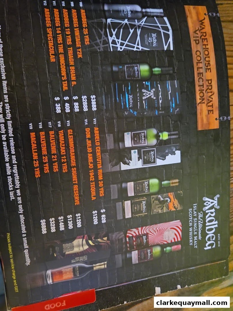 A menu featuring exclusive Ardbeg Scotch whiskies and other premium spirits with prices.