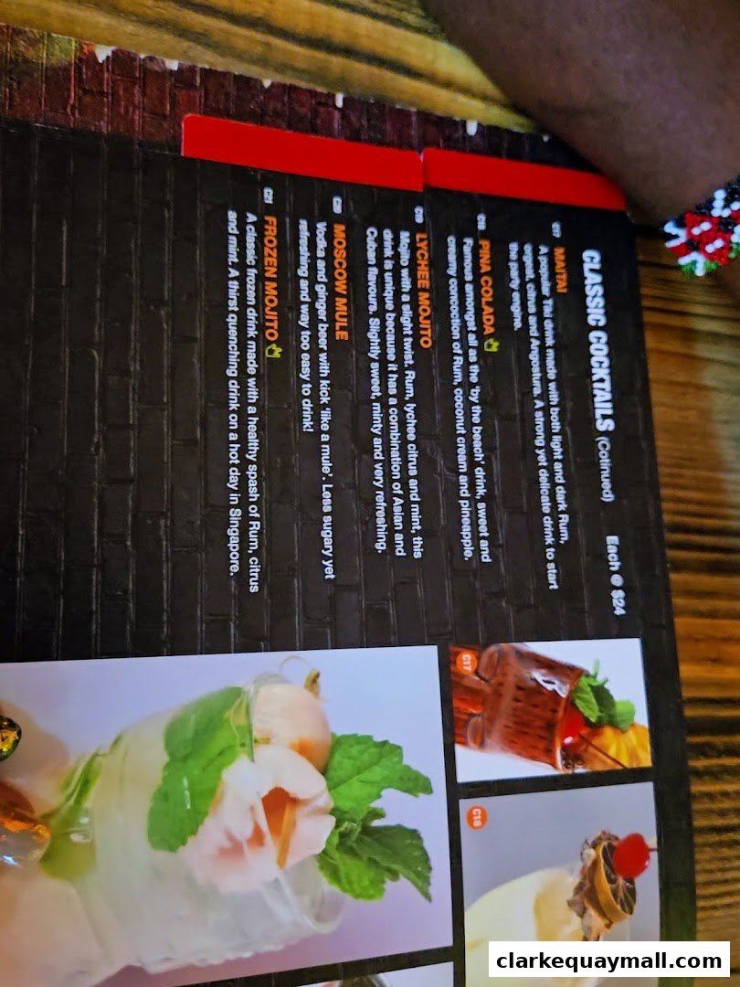 A menu page displaying classic cocktails with descriptions and prices.