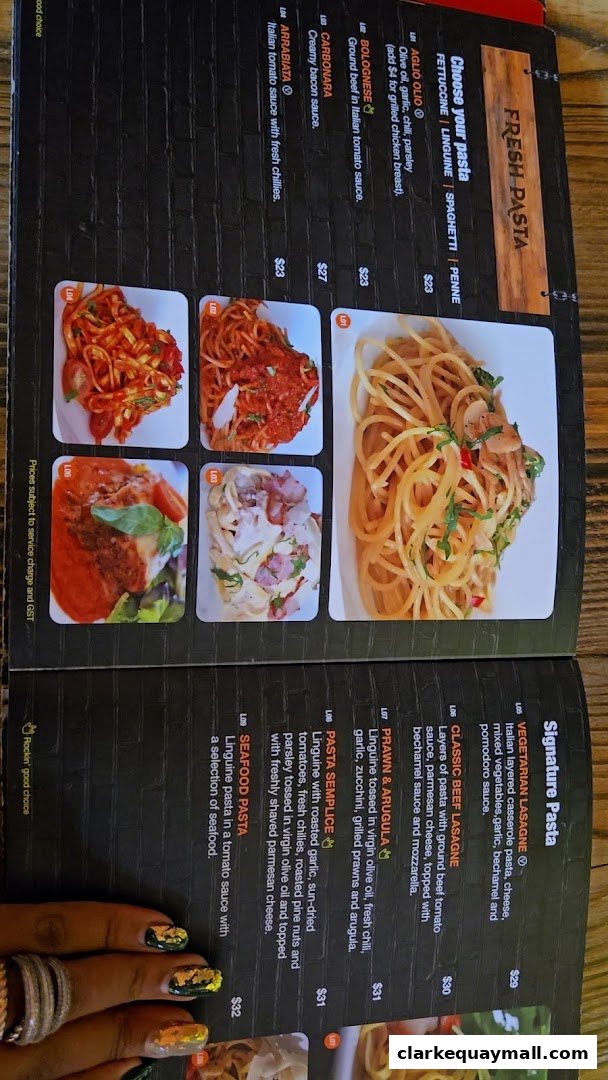 A menu page showcasing various pasta dishes with accompanying images and prices.