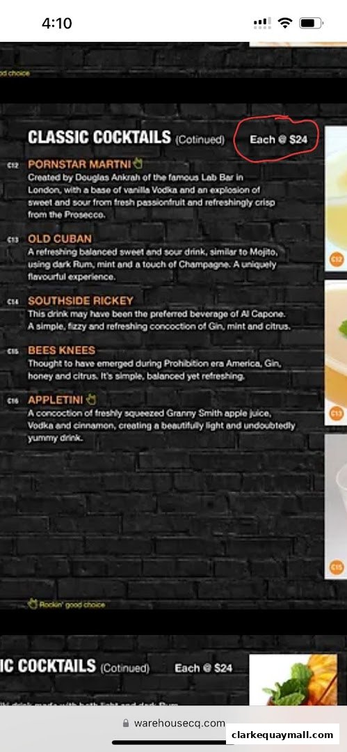 A menu listing classic cocktails with descriptions and prices.