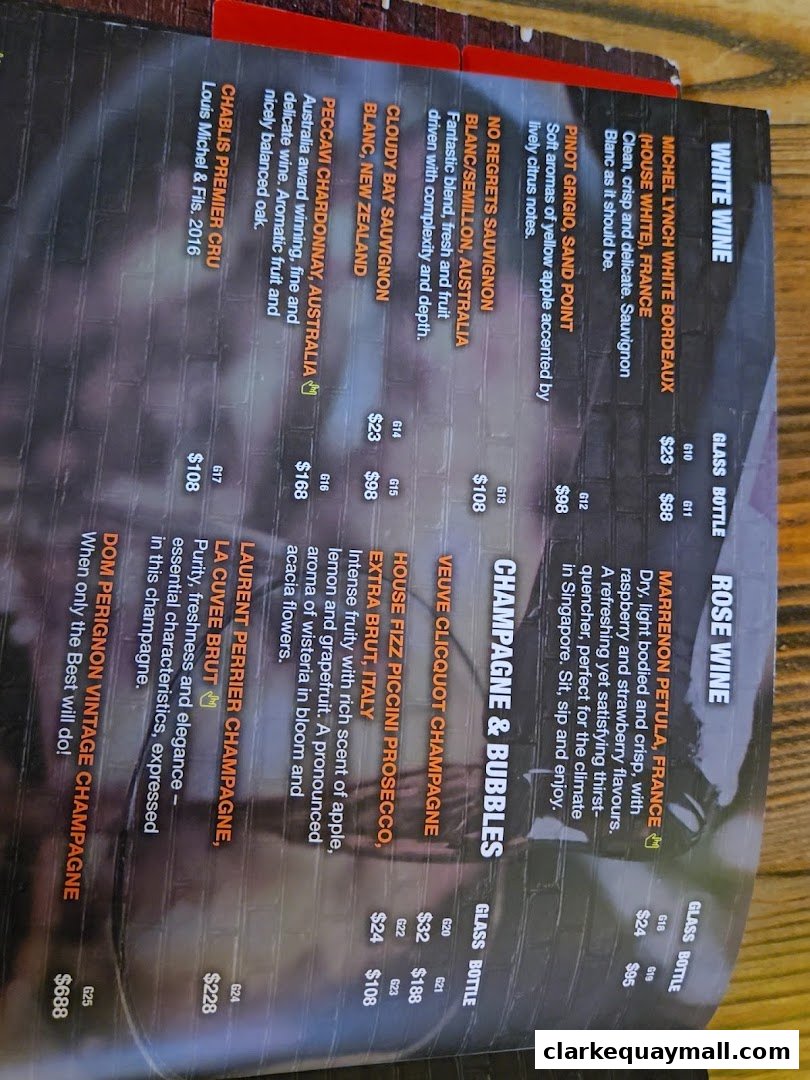 A menu featuring a selection of white wines, rosé wine, and champagne with prices.