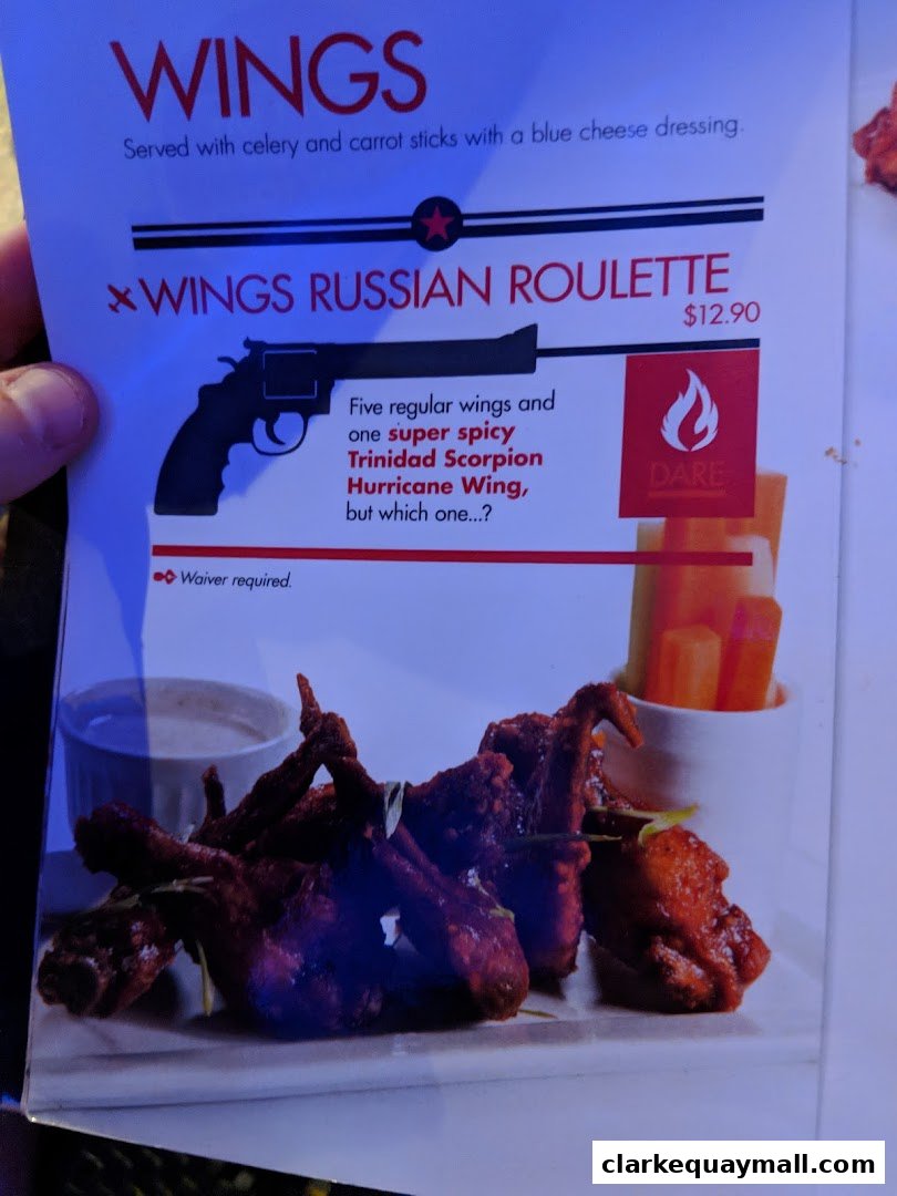 A menu item featuring spicy wings with a roulette theme and a waiver requirement.