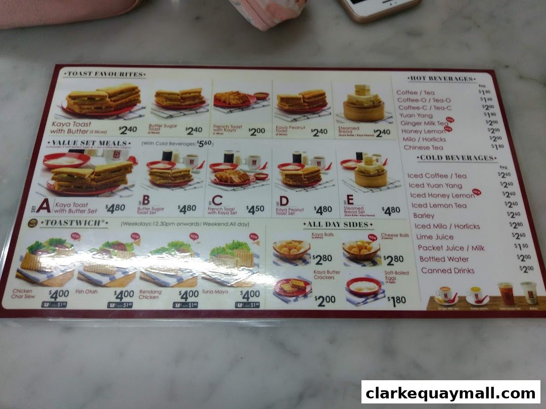 A menu from Ya Kun Kaya Toast featuring toast, set meals, sandwiches, sides, and beverages.