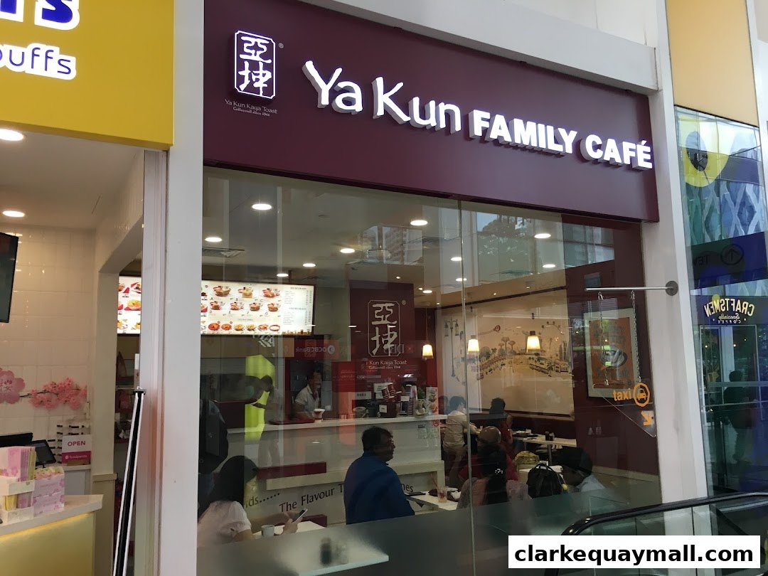 The exterior of Ya Kun Family Cafe, showcasing its signage and interior seating area.