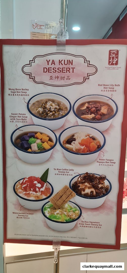 A menu board showcasing various Ya Kun dessert offerings with accompanying images.