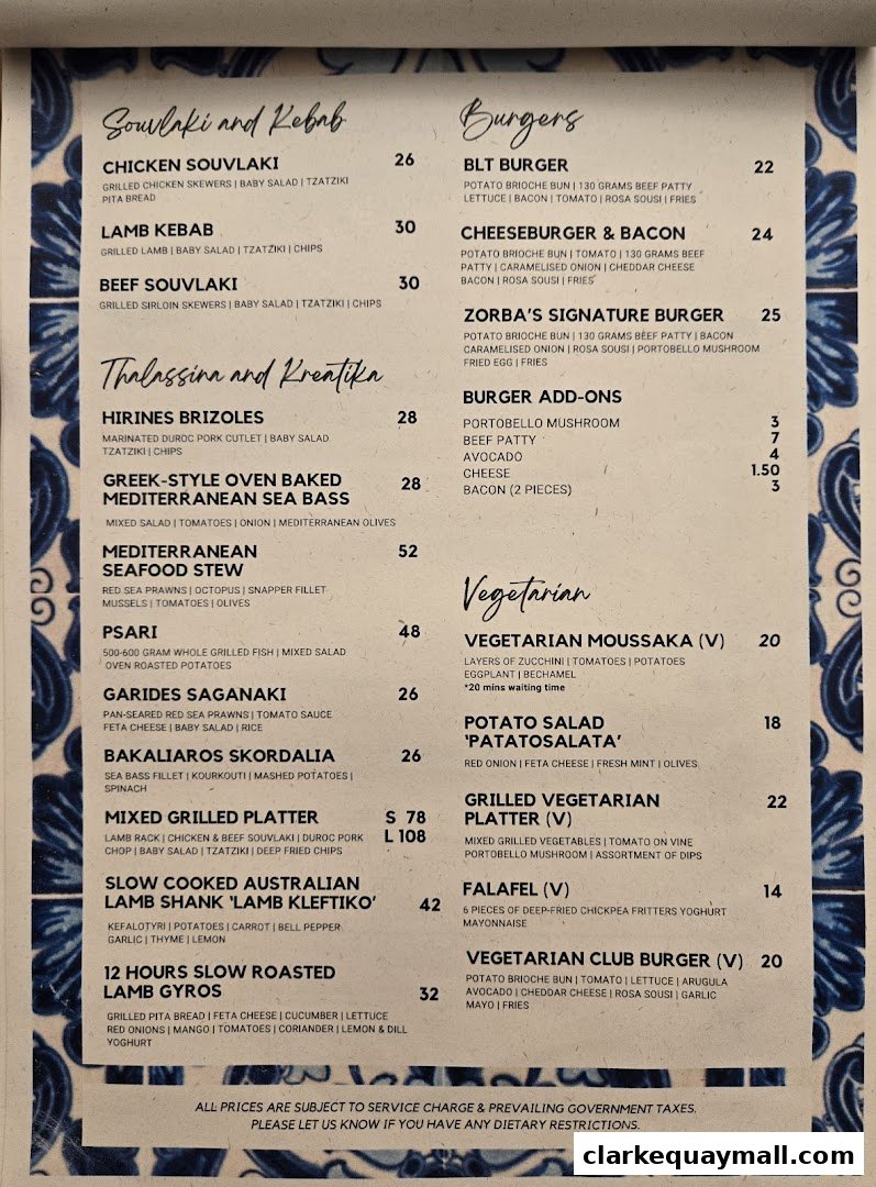 A menu from Zorba The Greek Taverna featuring Souvlaki, Kebab, Burgers, and Vegetarian dishes.