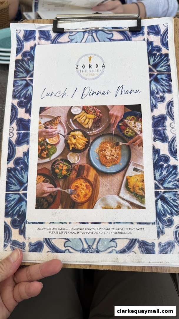 A menu from Zorba The Greek Taverna featuring a selection of delicious Greek dishes.