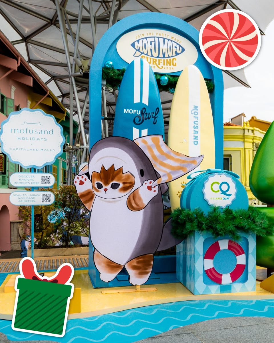 Mofusand shark character amidst Christmas lights